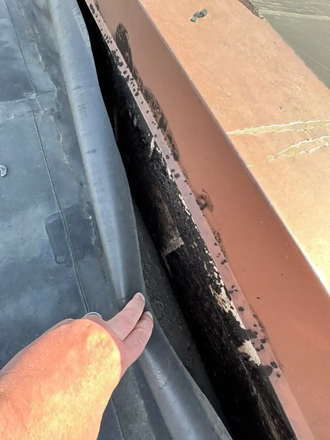 Tarping and dry-in on a Centerville commercial roof