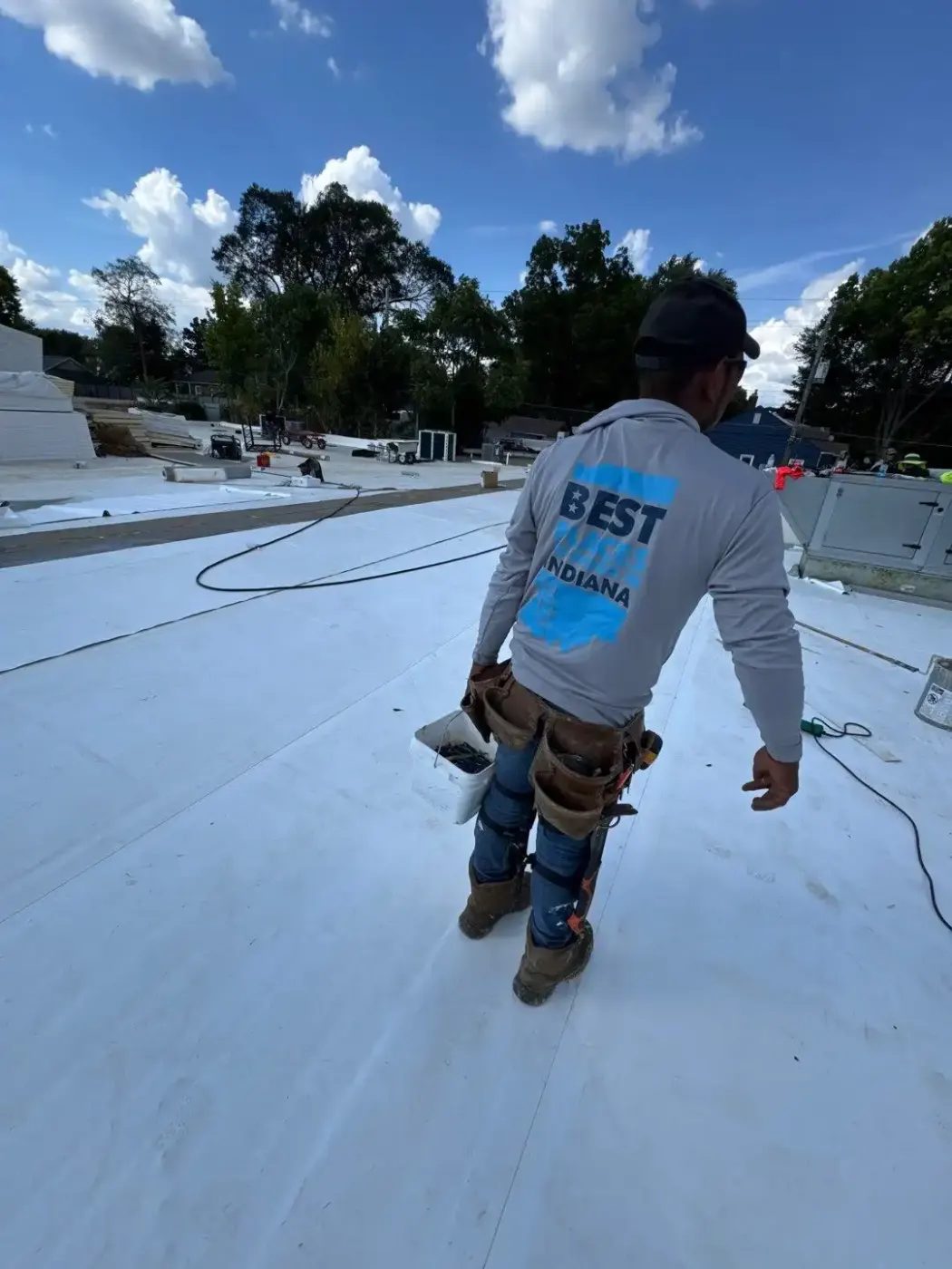Tarping and dry-in on a Centerville commercial roof